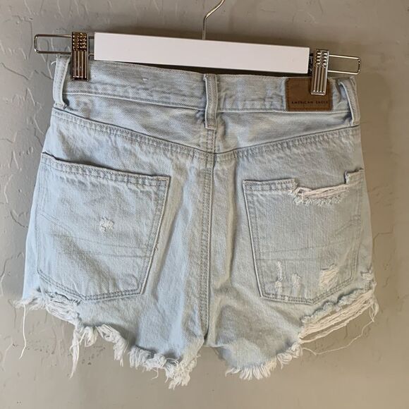American eagle faded distressed denim cut off jeans size 00. Decorative pockets. - Picture 3 of 11